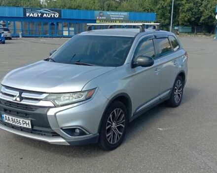 Сірий Міцубісі Аутлендер, об'ємом двигуна 2.36 л та пробігом 100 тис. км за 17700 $, фото 1 на Automoto.ua