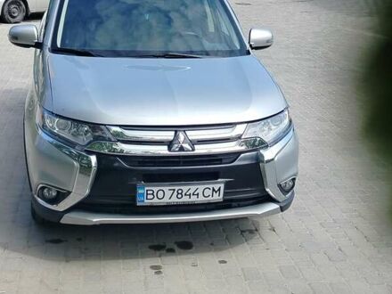 Серый Мицубиси Аутлендер, объемом двигателя 2.36 л и пробегом 95 тыс. км за 15999 $, фото 1 на Automoto.ua