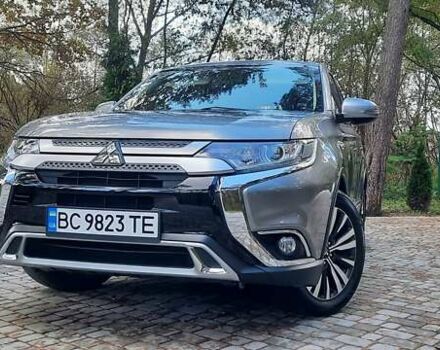 Сірий Міцубісі Аутлендер, об'ємом двигуна 2.36 л та пробігом 90 тис. км за 18000 $, фото 1 на Automoto.ua