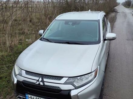 Серый Мицубиси Аутлендер, объемом двигателя 2.36 л и пробегом 101 тыс. км за 16400 $, фото 1 на Automoto.ua