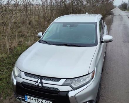 Серый Мицубиси Аутлендер, объемом двигателя 2.36 л и пробегом 101 тыс. км за 16400 $, фото 1 на Automoto.ua