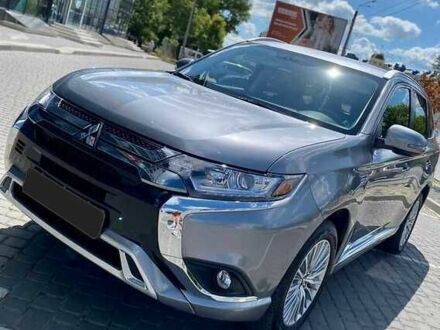 Серый Мицубиси Аутлендер, объемом двигателя 2 л и пробегом 81 тыс. км за 21000 $, фото 1 на Automoto.ua