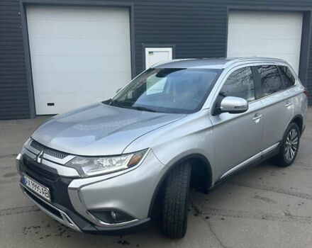Серый Мицубиси Аутлендер, объемом двигателя 2.4 л и пробегом 115 тыс. км за 17500 $, фото 1 на Automoto.ua
