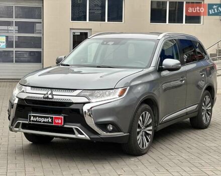 Серый Мицубиси Аутлендер, объемом двигателя 2.4 л и пробегом 131 тыс. км за 17440 $, фото 1 на Automoto.ua