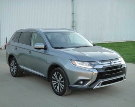 Серый Мицубиси Аутлендер, объемом двигателя 2.4 л и пробегом 42 тыс. км за 10400 $, фото 1 на Automoto.ua