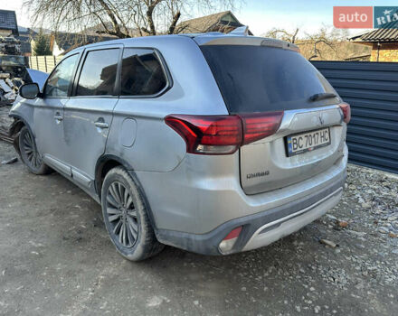 Серый Мицубиси Аутлендер, объемом двигателя 2.35 л и пробегом 100 тыс. км за 6703 $, фото 1 на Automoto.ua