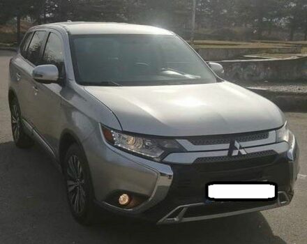 Сірий Міцубісі Аутлендер, об'ємом двигуна 2.4 л та пробігом 91 тис. км за 10599 $, фото 1 на Automoto.ua
