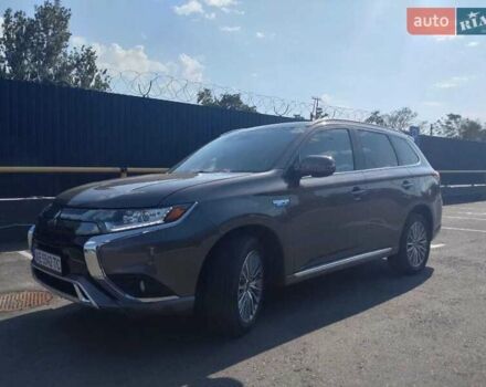 Серый Мицубиси Аутлендер, объемом двигателя 2 л и пробегом 63 тыс. км за 23000 $, фото 1 на Automoto.ua