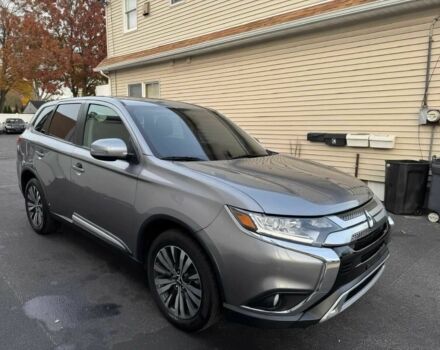 Серый Мицубиси Аутлендер, объемом двигателя 2.4 л и пробегом 48 тыс. км за 6900 $, фото 1 на Automoto.ua