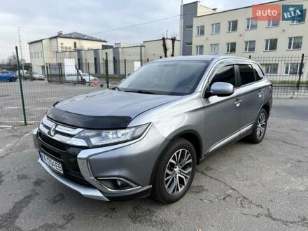 Серый Мицубиси Аутлендер, объемом двигателя 2.36 л и пробегом 136 тыс. км за 15000 $, фото 1 на Automoto.ua