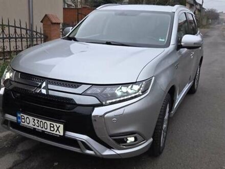 Серый Мицубиси Аутлендер, объемом двигателя 2.4 л и пробегом 174 тыс. км за 27300 $, фото 1 на Automoto.ua