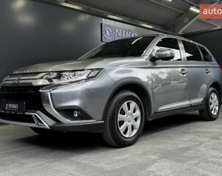 Серый Мицубиси Аутлендер, объемом двигателя 2 л и пробегом 91 тыс. км за 19000 $, фото 1 на Automoto.ua