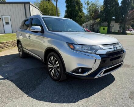 Серый Мицубиси Аутлендер, объемом двигателя 2.4 л и пробегом 45 тыс. км за 5800 $, фото 1 на Automoto.ua