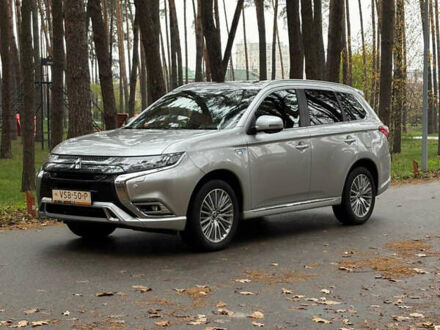 Серый Мицубиси Аутлендер, объемом двигателя 2.36 л и пробегом 179 тыс. км за 24900 $, фото 1 на Automoto.ua