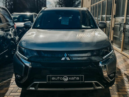 Серый Мицубиси Аутлендер, объемом двигателя 2.4 л и пробегом 95 тыс. км за 16500 $, фото 1 на Automoto.ua