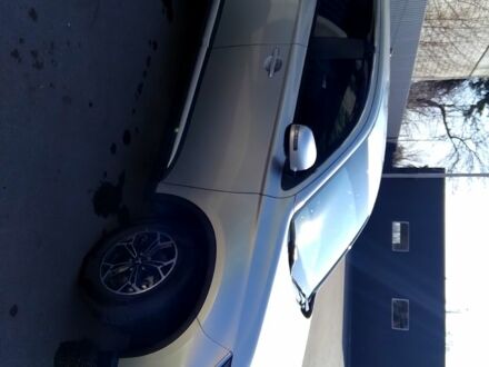 Серый Мицубиси Аутлендер, объемом двигателя 2 л и пробегом 32 тыс. км за 21000 $, фото 1 на Automoto.ua