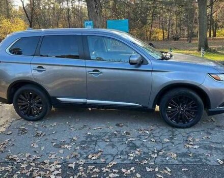 Серый Мицубиси Аутлендер, объемом двигателя 2.4 л и пробегом 120 тыс. км за 21200 $, фото 1 на Automoto.ua