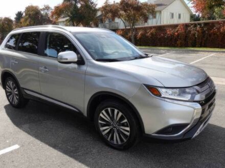 Серый Мицубиси Аутлендер, объемом двигателя 2.4 л и пробегом 49 тыс. км за 12100 $, фото 1 на Automoto.ua