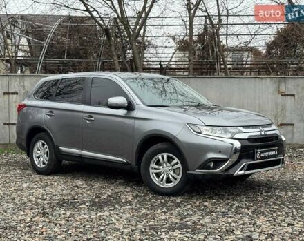 Серый Мицубиси Аутлендер, объемом двигателя 2 л и пробегом 122 тыс. км за 20990 $, фото 1 на Automoto.ua