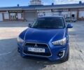 Синий Мицубиси Аутлендер, объемом двигателя 2 л и пробегом 250 тыс. км за 10700 $, фото 1 на Automoto.ua