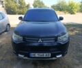 Синий Мицубиси Аутлендер, объемом двигателя 3 л и пробегом 250 тыс. км за 12000 $, фото 1 на Automoto.ua