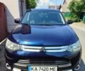 Синій Міцубісі Аутлендер, об'ємом двигуна 2.4 л та пробігом 231 тис. км за 11200 $, фото 1 на Automoto.ua