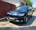 Синій Міцубісі Аутлендер, об'ємом двигуна 2.4 л та пробігом 231 тис. км за 11200 $, фото 1 на Automoto.ua