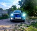 Синий Мицубиси Аутлендер, объемом двигателя 2 л и пробегом 340 тыс. км за 4700 $, фото 1 на Automoto.ua
