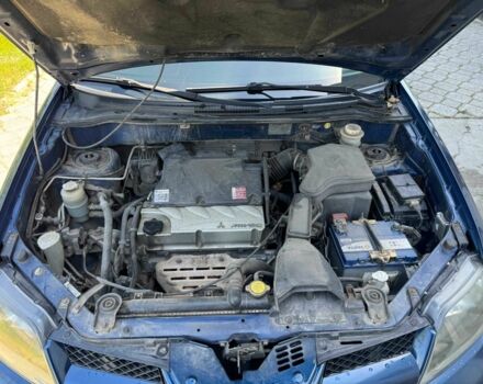 Синий Мицубиси Аутлендер, объемом двигателя 0.24 л и пробегом 280 тыс. км за 5500 $, фото 14 на Automoto.ua