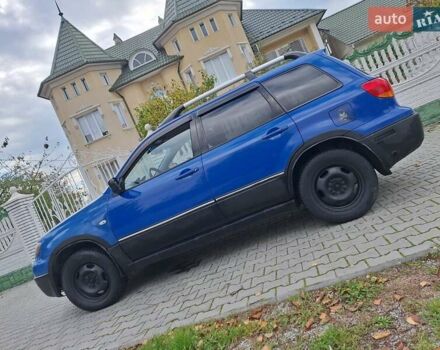 Синій Міцубісі Аутлендер, об'ємом двигуна 2.4 л та пробігом 234 тис. км за 4100 $, фото 1 на Automoto.ua