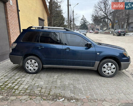 Синій Міцубісі Аутлендер, об'ємом двигуна 2 л та пробігом 340 тис. км за 5000 $, фото 11 на Automoto.ua
