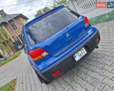 Синій Міцубісі Аутлендер, об'ємом двигуна 2.4 л та пробігом 234 тис. км за 4100 $, фото 4 на Automoto.ua