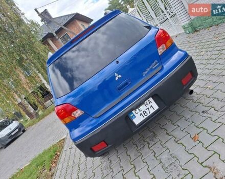 Синій Міцубісі Аутлендер, об'ємом двигуна 2.4 л та пробігом 234 тис. км за 4300 $, фото 7 на Automoto.ua