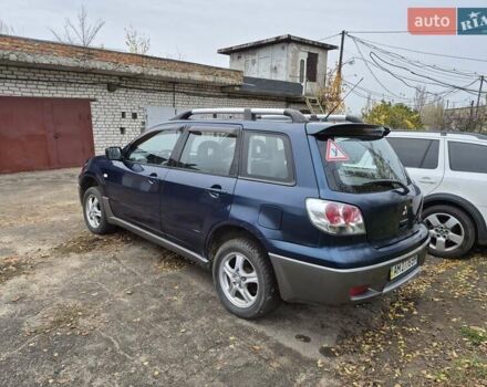 Синій Міцубісі Аутлендер, об'ємом двигуна 2 л та пробігом 211 тис. км за 4600 $, фото 4 на Automoto.ua