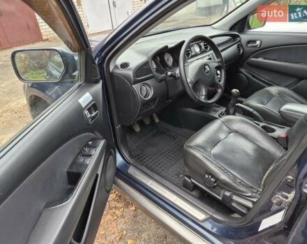 Синій Міцубісі Аутлендер, об'ємом двигуна 2 л та пробігом 211 тис. км за 4600 $, фото 9 на Automoto.ua