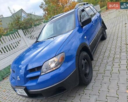 Синій Міцубісі Аутлендер, об'ємом двигуна 2.4 л та пробігом 234 тис. км за 4100 $, фото 16 на Automoto.ua