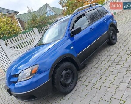 Синій Міцубісі Аутлендер, об'ємом двигуна 2.4 л та пробігом 234 тис. км за 4300 $, фото 17 на Automoto.ua