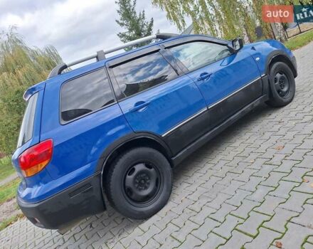 Синій Міцубісі Аутлендер, об'ємом двигуна 2.4 л та пробігом 234 тис. км за 4100 $, фото 9 на Automoto.ua