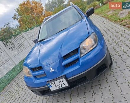 Синій Міцубісі Аутлендер, об'ємом двигуна 2.4 л та пробігом 234 тис. км за 4100 $, фото 15 на Automoto.ua