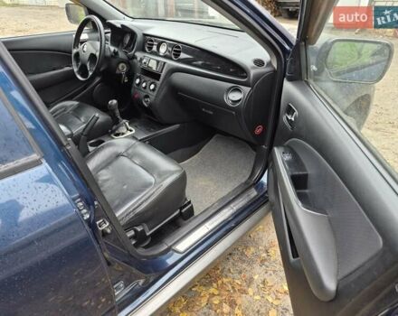 Синій Міцубісі Аутлендер, об'ємом двигуна 2 л та пробігом 211 тис. км за 4600 $, фото 19 на Automoto.ua