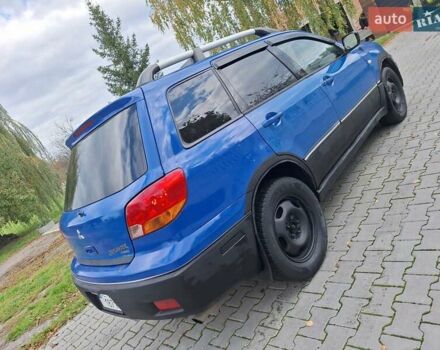 Синій Міцубісі Аутлендер, об'ємом двигуна 2.4 л та пробігом 234 тис. км за 4100 $, фото 7 на Automoto.ua