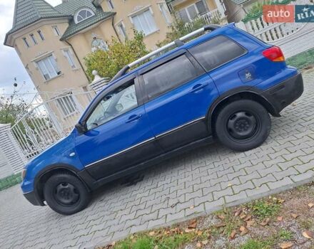 Синій Міцубісі Аутлендер, об'ємом двигуна 2.4 л та пробігом 234 тис. км за 4300 $, фото 1 на Automoto.ua