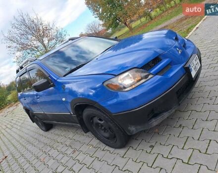 Синій Міцубісі Аутлендер, об'ємом двигуна 2.4 л та пробігом 234 тис. км за 4300 $, фото 12 на Automoto.ua