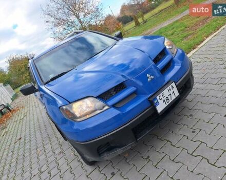 Синій Міцубісі Аутлендер, об'ємом двигуна 2.4 л та пробігом 234 тис. км за 4100 $, фото 12 на Automoto.ua