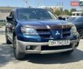 Синий Мицубиси Аутлендер, объемом двигателя 2 л и пробегом 170 тыс. км за 5200 $, фото 2 на Automoto.ua