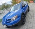 Синий Мицубиси Аутлендер, объемом двигателя 2.38 л и пробегом 234 тыс. км за 4300 $, фото 16 на Automoto.ua