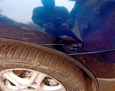 Синий Мицубиси Аутлендер, объемом двигателя 2 л и пробегом 195 тыс. км за 6500 $, фото 2 на Automoto.ua