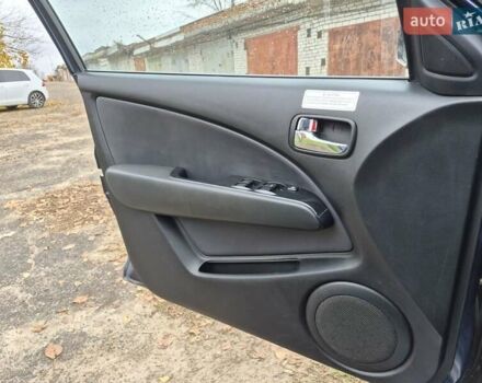 Синій Міцубісі Аутлендер, об'ємом двигуна 2 л та пробігом 211 тис. км за 4600 $, фото 11 на Automoto.ua