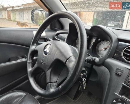 Синій Міцубісі Аутлендер, об'ємом двигуна 2 л та пробігом 211 тис. км за 4600 $, фото 13 на Automoto.ua