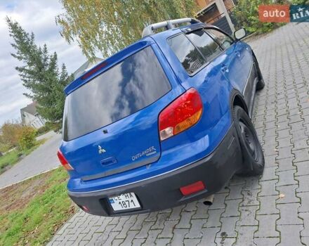 Синій Міцубісі Аутлендер, об'ємом двигуна 2.4 л та пробігом 234 тис. км за 4100 $, фото 6 на Automoto.ua